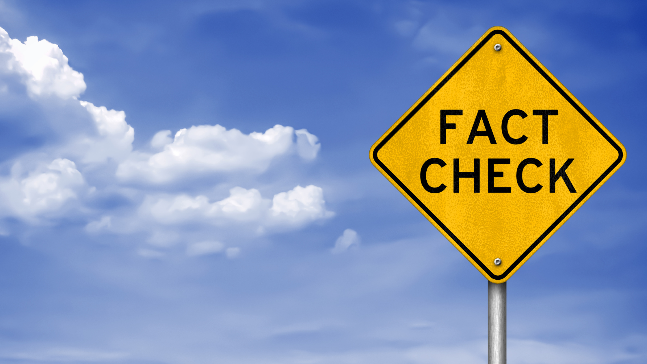Fact Check road sign, blue sky with clouds background